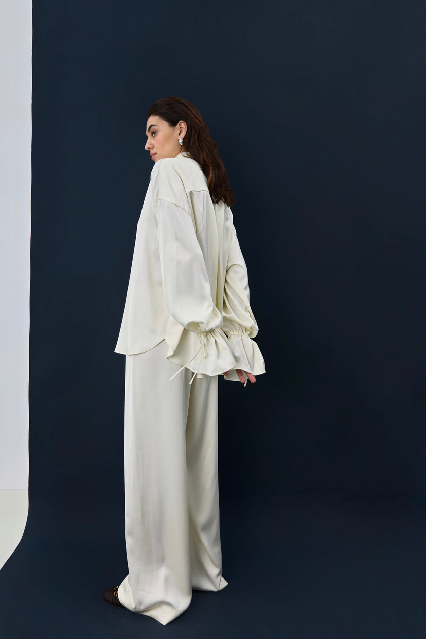 Штани сатинові молочні