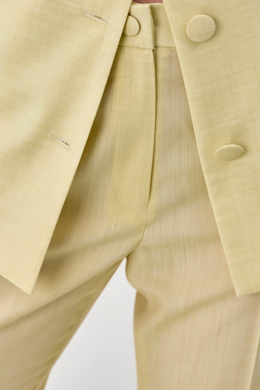 Жовті брюки кльош