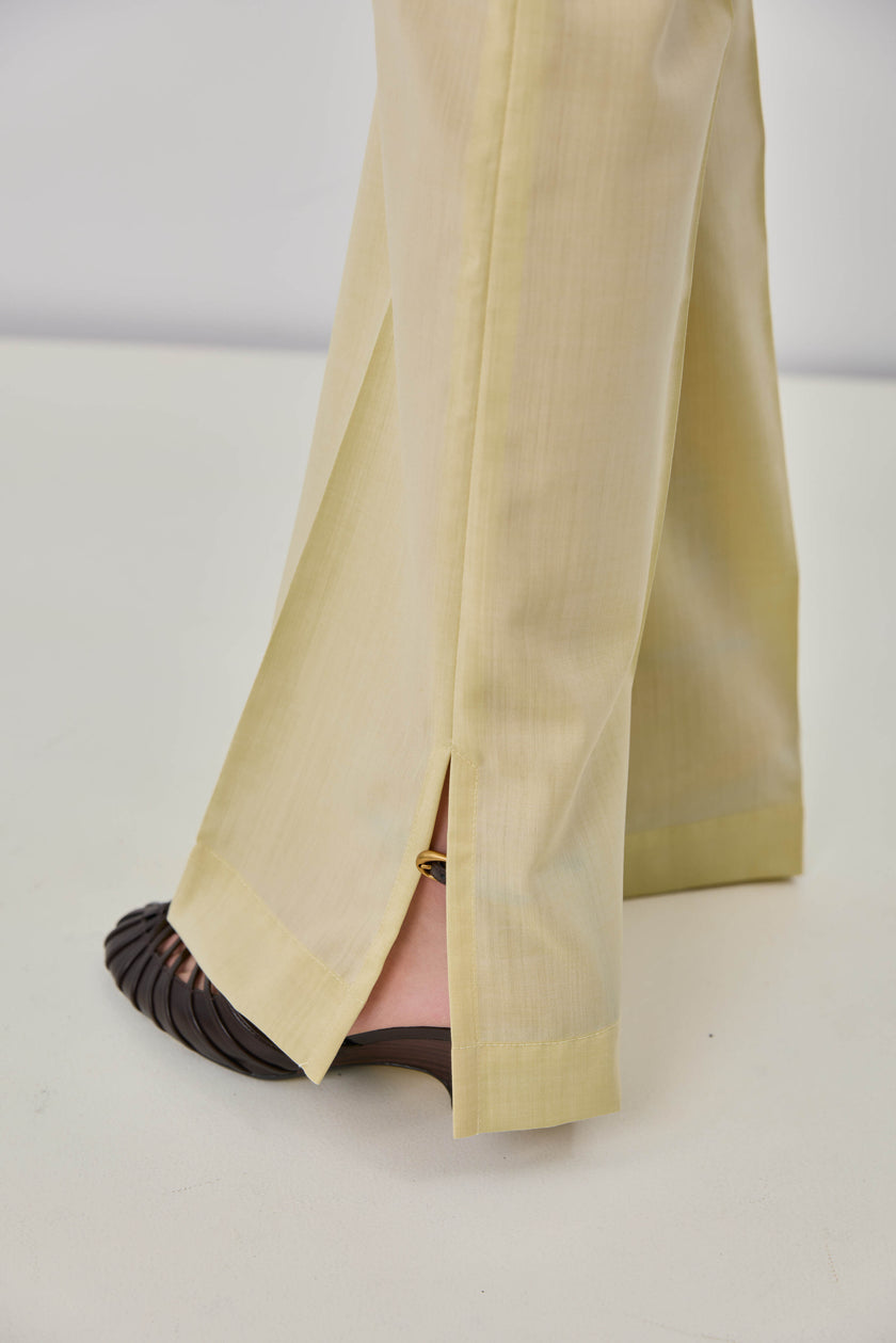 Жовті брюки кльош